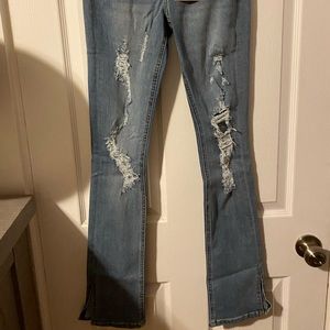 New with tags high rise wide slit leg jean. Size 3